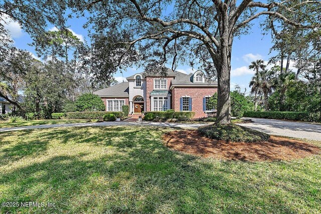 view of front of house with a front yard