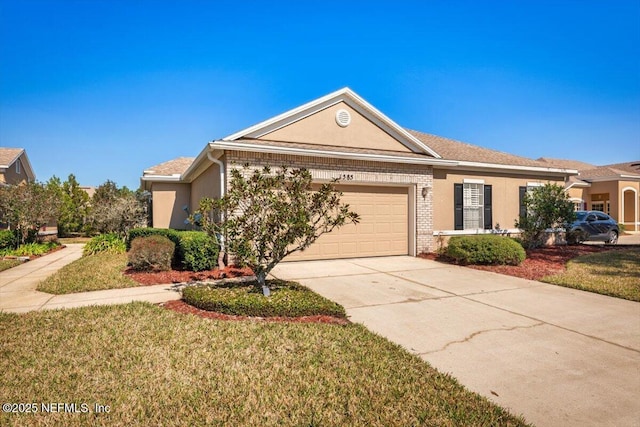 view of front of property with a garage and a front yard