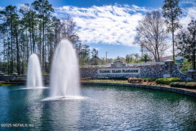 view of property's community featuring a water view