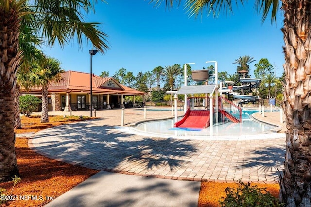 view of play area with a community pool