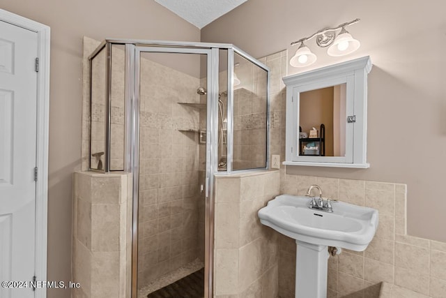 full bathroom featuring a shower stall