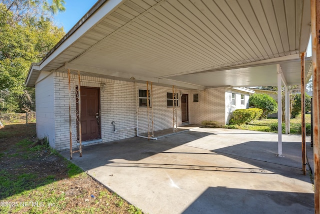 view of patio / terrace with a carport