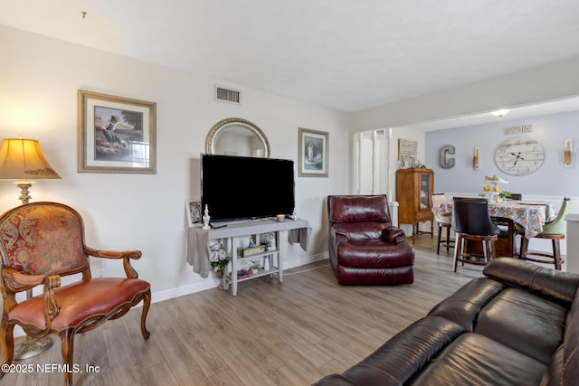 living room with light wood-type flooring