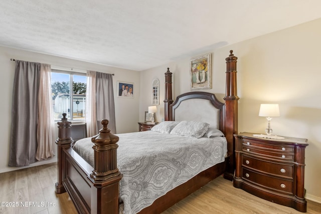 bedroom with light hardwood / wood-style flooring