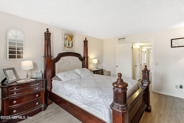 bedroom with light hardwood / wood-style flooring