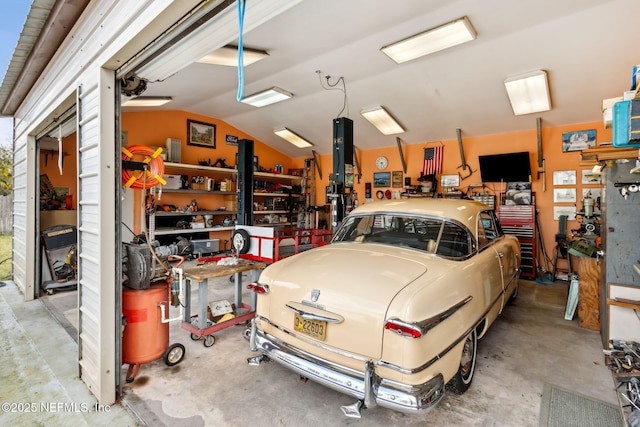 garage featuring a workshop area