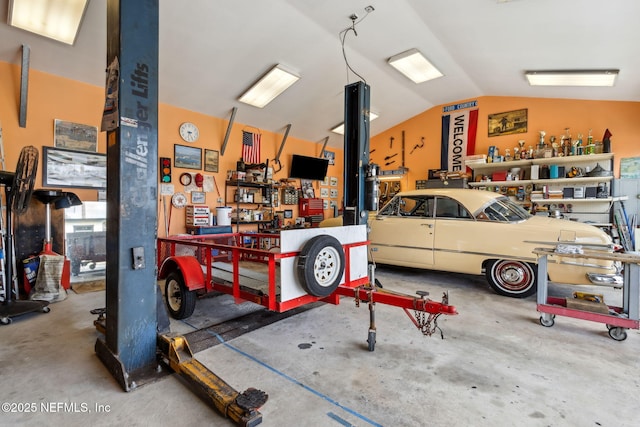 garage with a workshop area