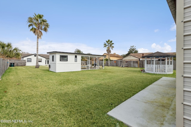 view of yard with a gazebo and a patio area