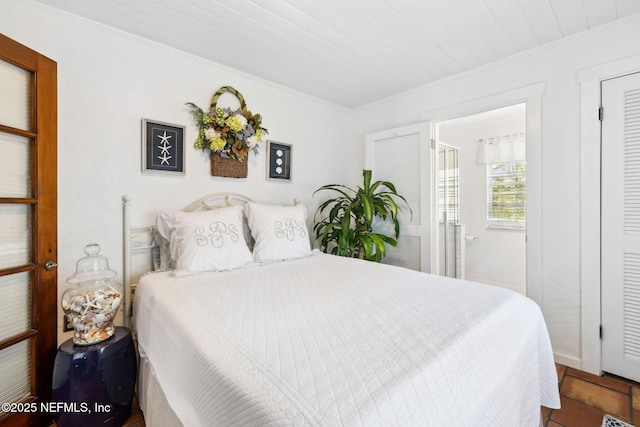 bedroom with crown molding