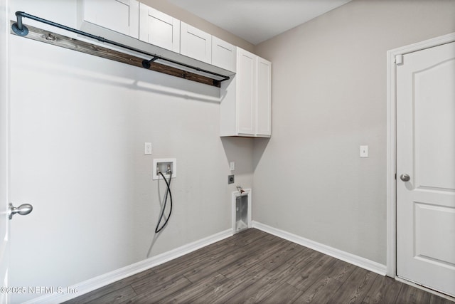 laundry room with cabinets, washer hookup, hookup for an electric dryer, and dark hardwood / wood-style flooring