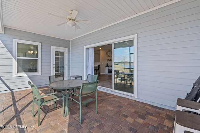 view of patio featuring ceiling fan