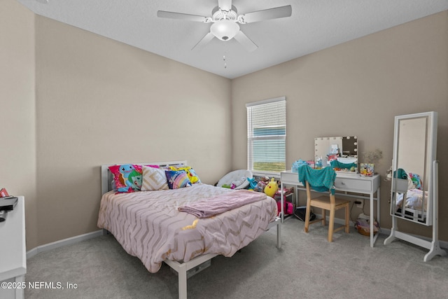 bedroom featuring ceiling fan and carpet flooring