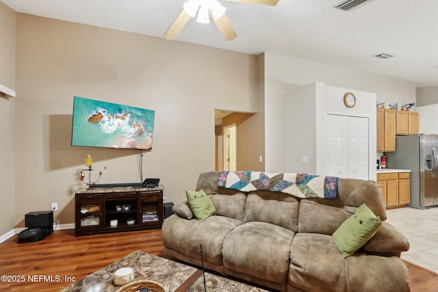 1336 River City St, Saint Augustine, FL 32092 - living area featuring a ceiling fan, baseboards, visible vents, and light wood finished floors