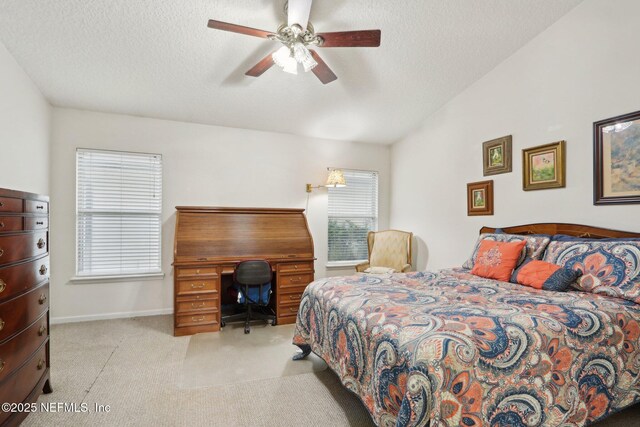1336 River City St, Saint Augustine, FL 32092 - carpeted bedroom with lofted ceiling, ceiling fan, baseboards, and a textured ceiling
