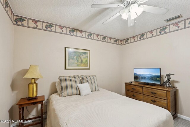 1336 River City St, Saint Augustine, FL 32092 - bedroom featuring baseboards, ceiling fan, visible vents, and a textured ceiling