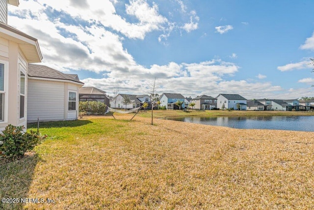 view of yard featuring a water view