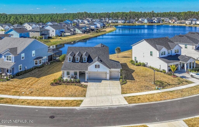 aerial view featuring a water view