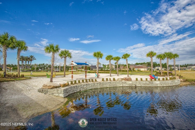 view of property's community featuring a water view