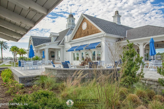 back of property featuring a patio