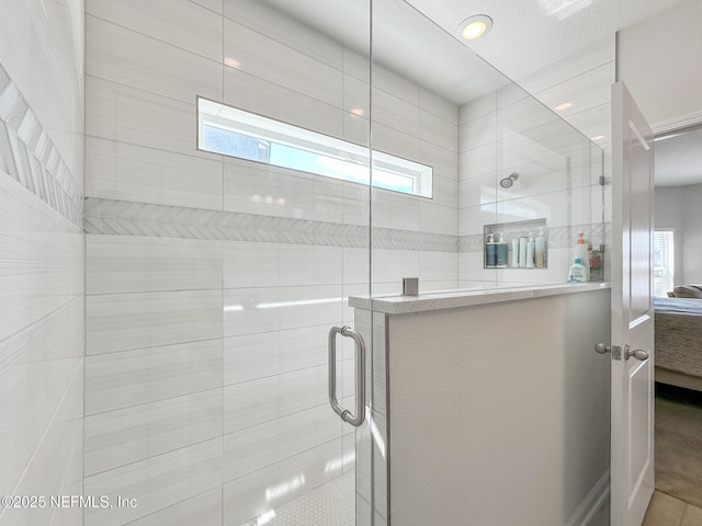 bathroom featuring an enclosed shower