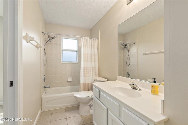 full bathroom featuring tile patterned floors, toilet, a textured ceiling, vanity, and shower / bathtub combination with curtain