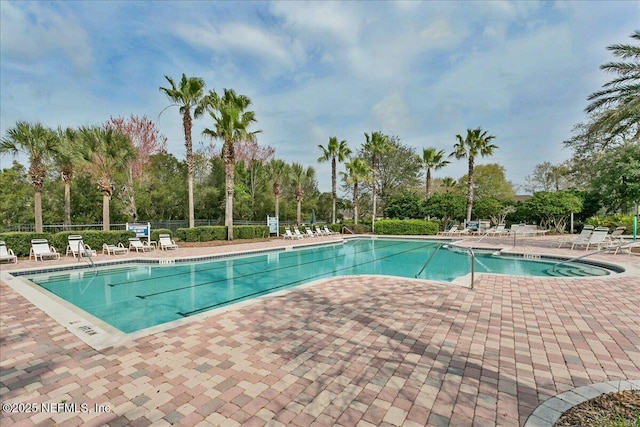 view of swimming pool featuring a patio area