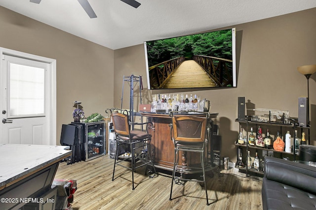 interior space with light hardwood / wood-style floors and ceiling fan