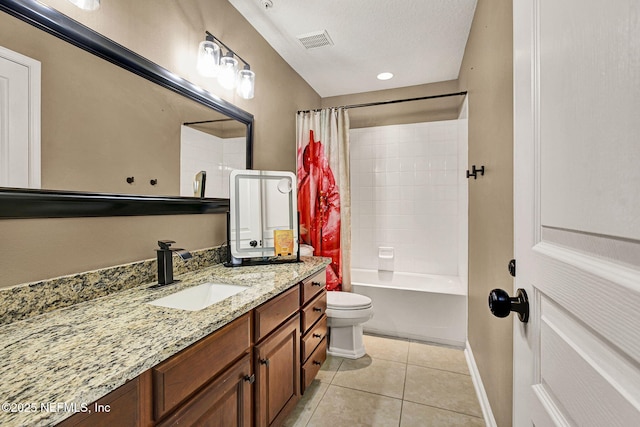 full bathroom with tile patterned floors, toilet, a textured ceiling, vanity, and shower / bath combo