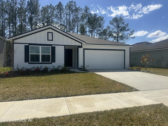 3217 Golden Eye Dr, Orange Park, FL 32065 - ranch-style home with a garage, a front yard, board and batten siding, and driveway