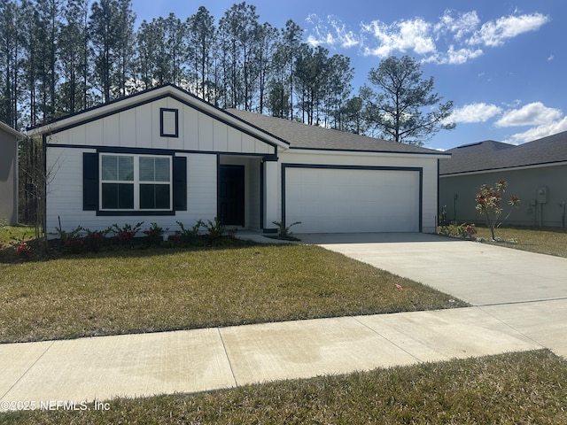 ranch-style home with a garage, a front yard, board and batten siding, and driveway