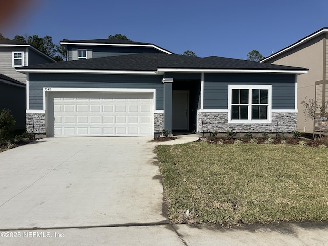 view of front facade featuring a garage, stone siding, a front lawn, and driveway