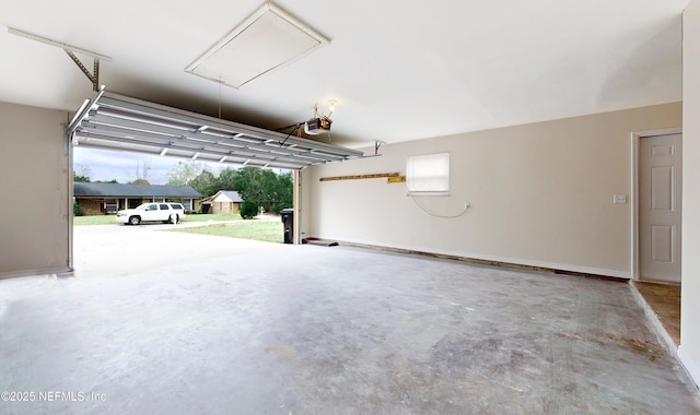 garage featuring a garage door opener