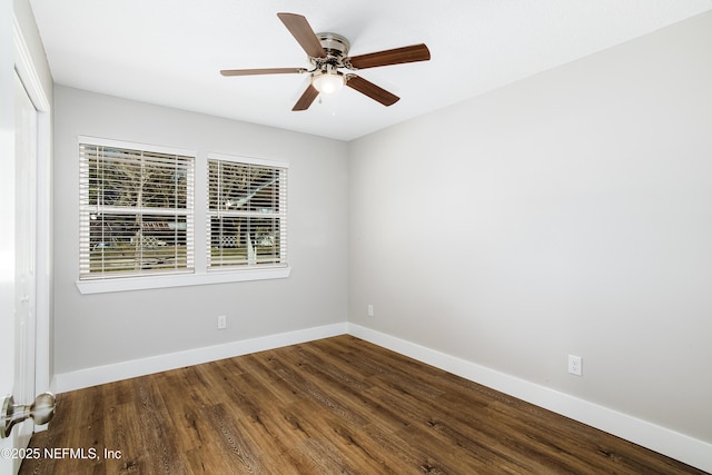 spare room with wood-type flooring and ceiling fan