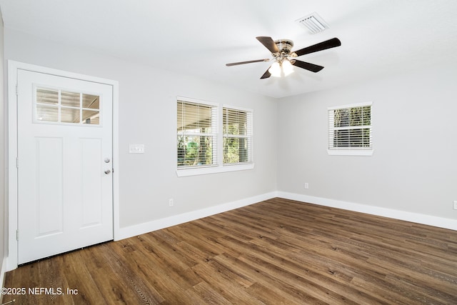 foyer entrance with hardwood / wood-style floors and ceiling fan