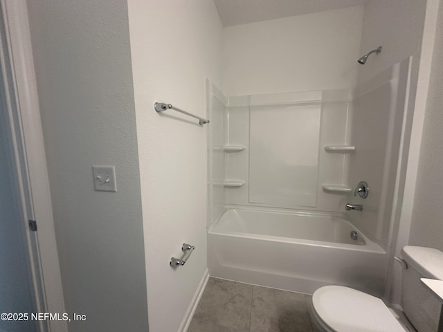 full bathroom featuring shower / bathing tub combination, toilet, and tile patterned flooring