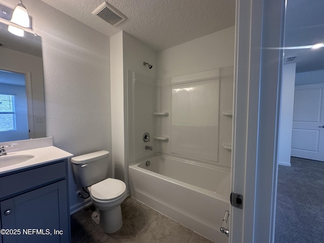 full bath featuring visible vents, toilet, vanity, a textured ceiling, and  shower combination