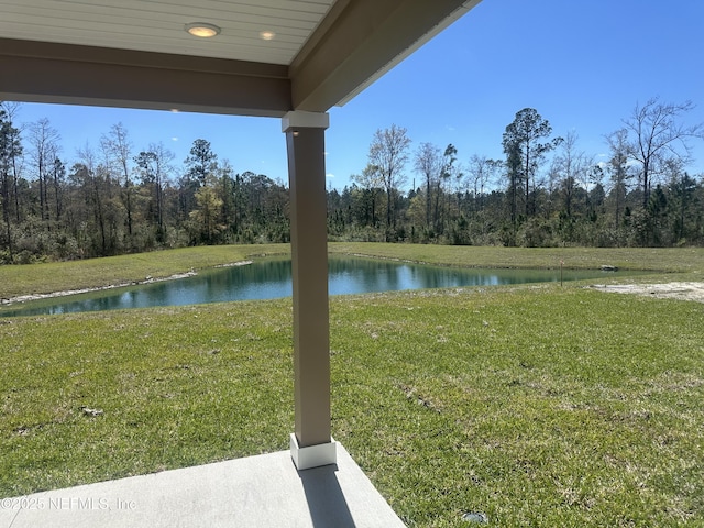 view of water feature featuring a wooded view