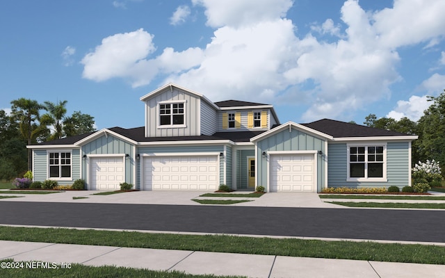 view of front of property with driveway and board and batten siding