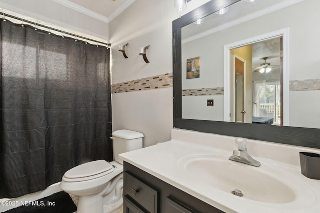 bathroom with crown molding, vanity, toilet, and walk in shower