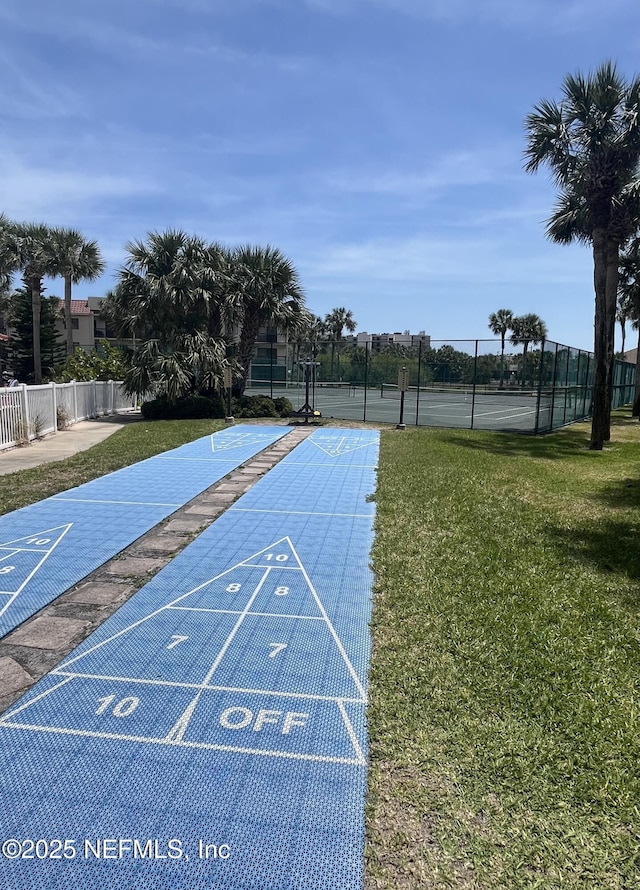 4250 A1A S Unit L16, Saint Augustine, FL 32080 - view of home's community featuring a lawn, shuffleboard, a tennis court, and fence