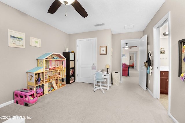 playroom with light colored carpet