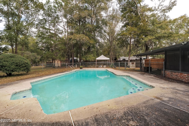 view of swimming pool featuring a patio