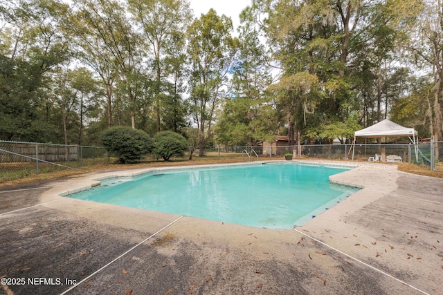 view of pool featuring a gazebo and a patio