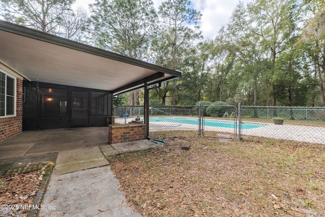 view of yard with a fenced in pool