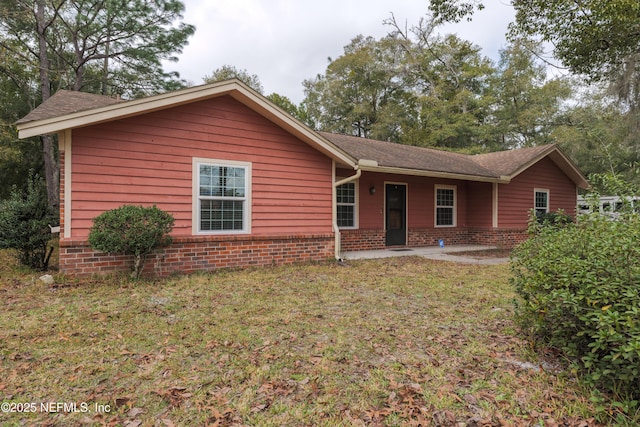 view of front of home with a front yard