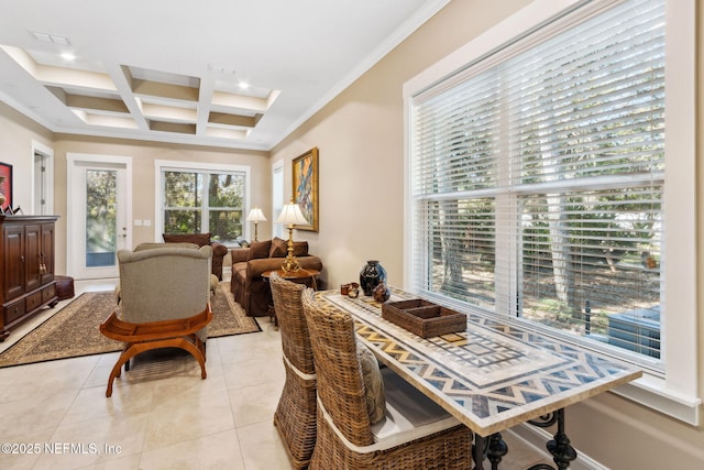 tiled dining area with coffered ceiling, ornamental molding, and beamed ceiling