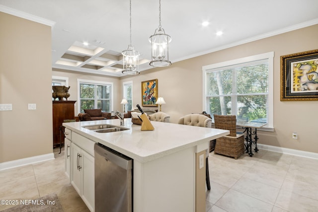 kitchen featuring pendant lighting, sink, an island with sink, white cabinets, and stainless steel dishwasher