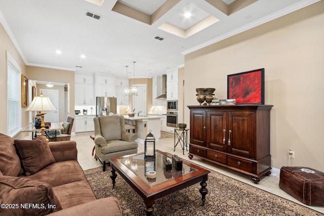 living room with an inviting chandelier, ornamental molding, coffered ceiling, and beam ceiling