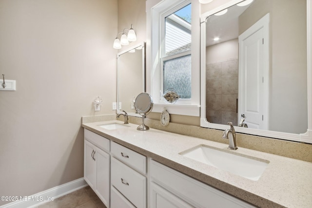 bathroom with vanity and tile patterned flooring