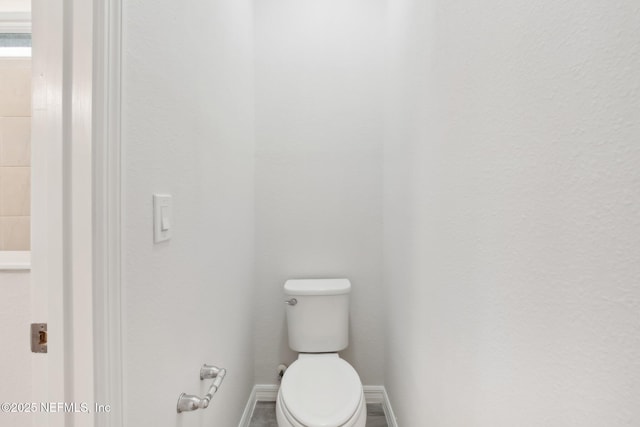 bathroom featuring toilet